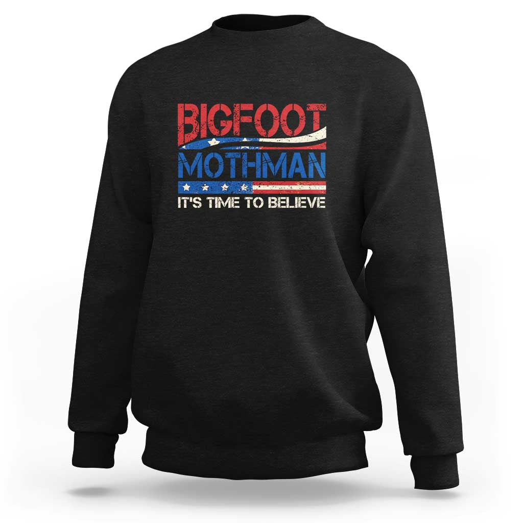 Black crewneck sweatshirt with Bigfoot Mothman graphic and "It's Time to Believe" text