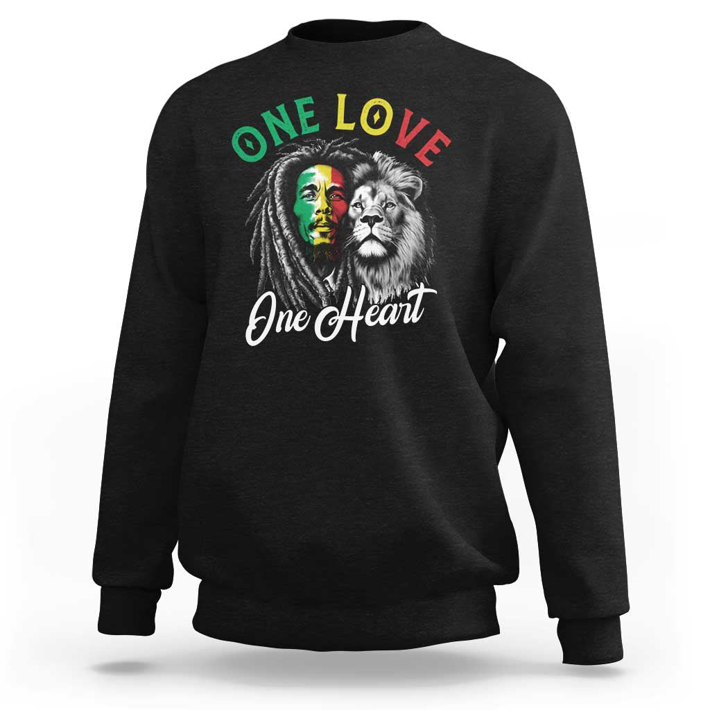 Black sweatshirt with “One Love / One Heart” lion graphic on chest