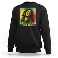 Black sweatshirt with reggae portrait graphic and “ROOTS REGGAE” text on front.