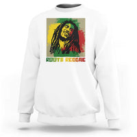 White sweatshirt with reggae portrait graphic and “ROOTS REGGAE” text on front.