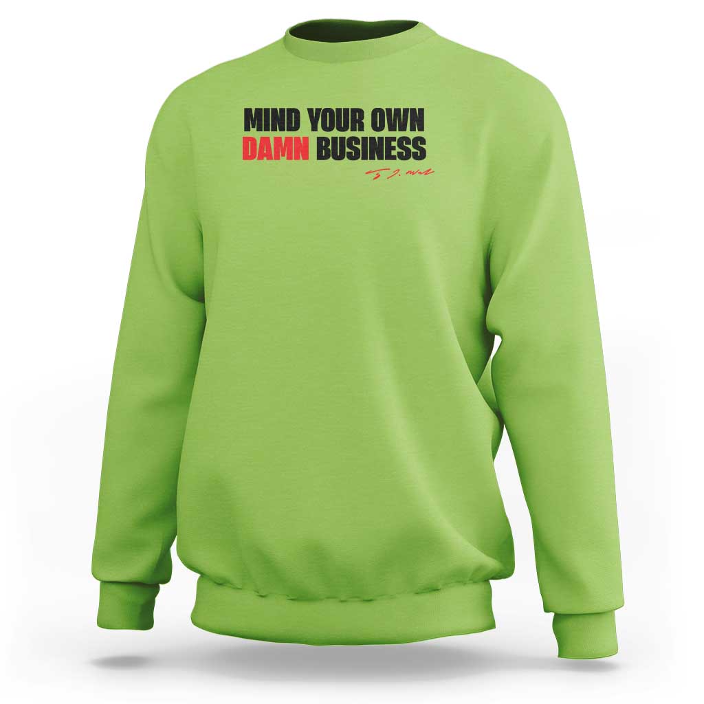 Lime green sweatshirt with “MIND YOUR OWN DAMN BUSINESS” graphic on chest