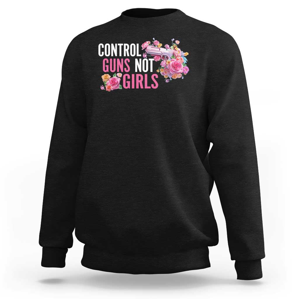 Women’s black sweatshirt with “CONTROL GUNS NOT GIRLS” floral graphic on chest