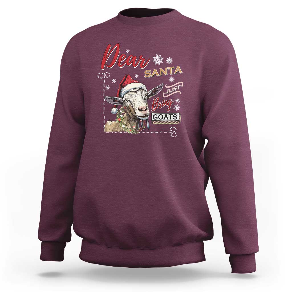 Maroon crewneck sweatshirt with “Dear Santa” graphic and goat illustration