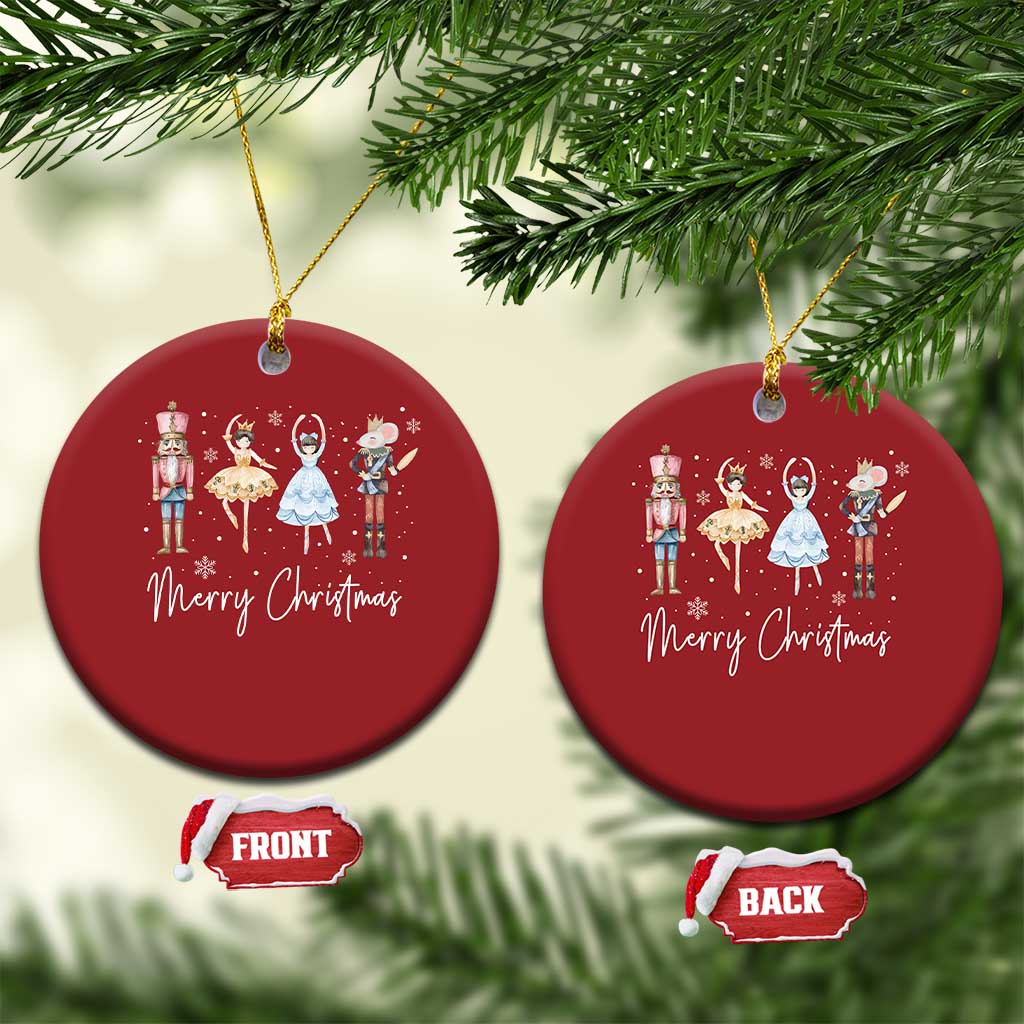 Two red round Christmas ornaments with nutcracker figures and “Merry Christmas” text