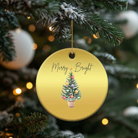 Gold round Christmas ornament hanging on pine branch, “Merry Bright” and tree graphic