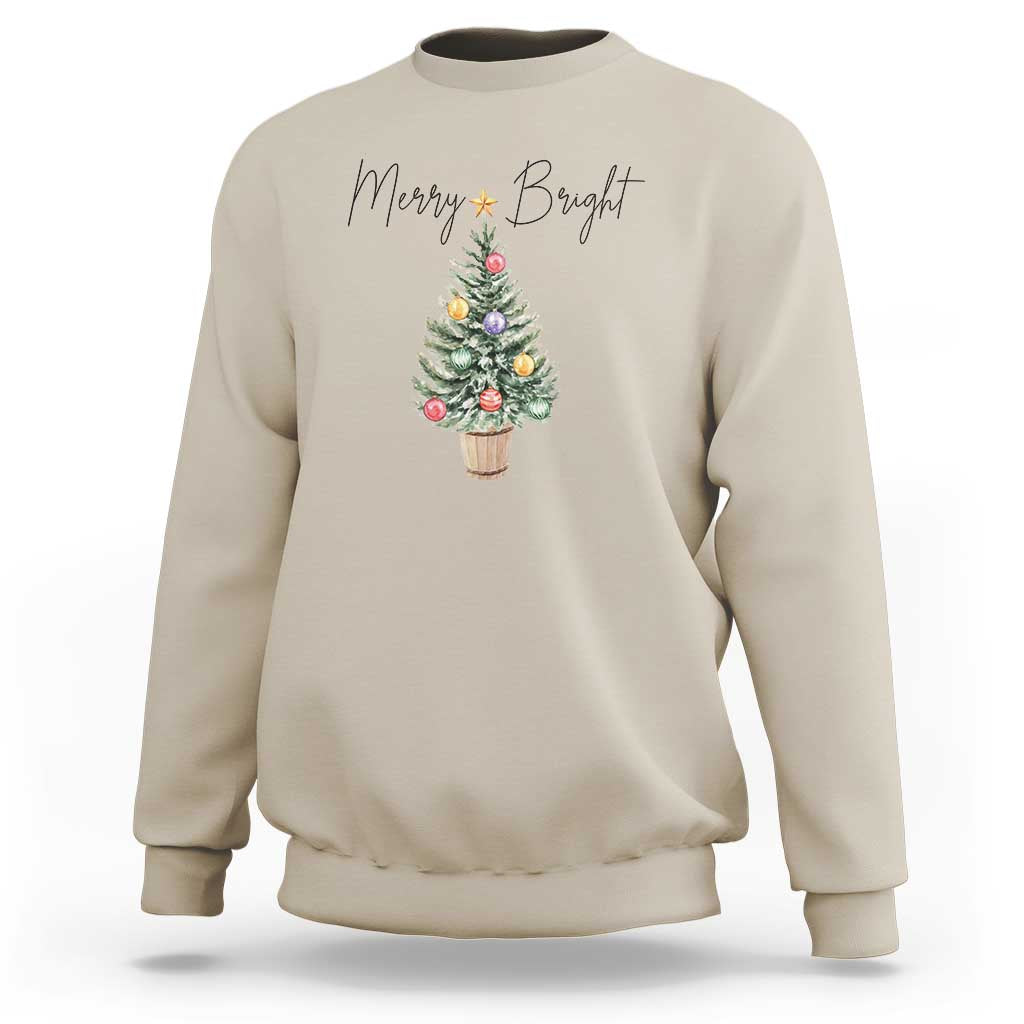 Sand crewneck sweatshirt with Merry Bright text and decorated Christmas tree graphic