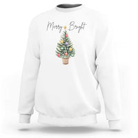White crewneck sweatshirt with Merry Bright text and decorated Christmas tree graphic