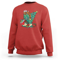 Red crewneck sweatshirt with colorful Bigfoot and Santa Christmas tree graphic