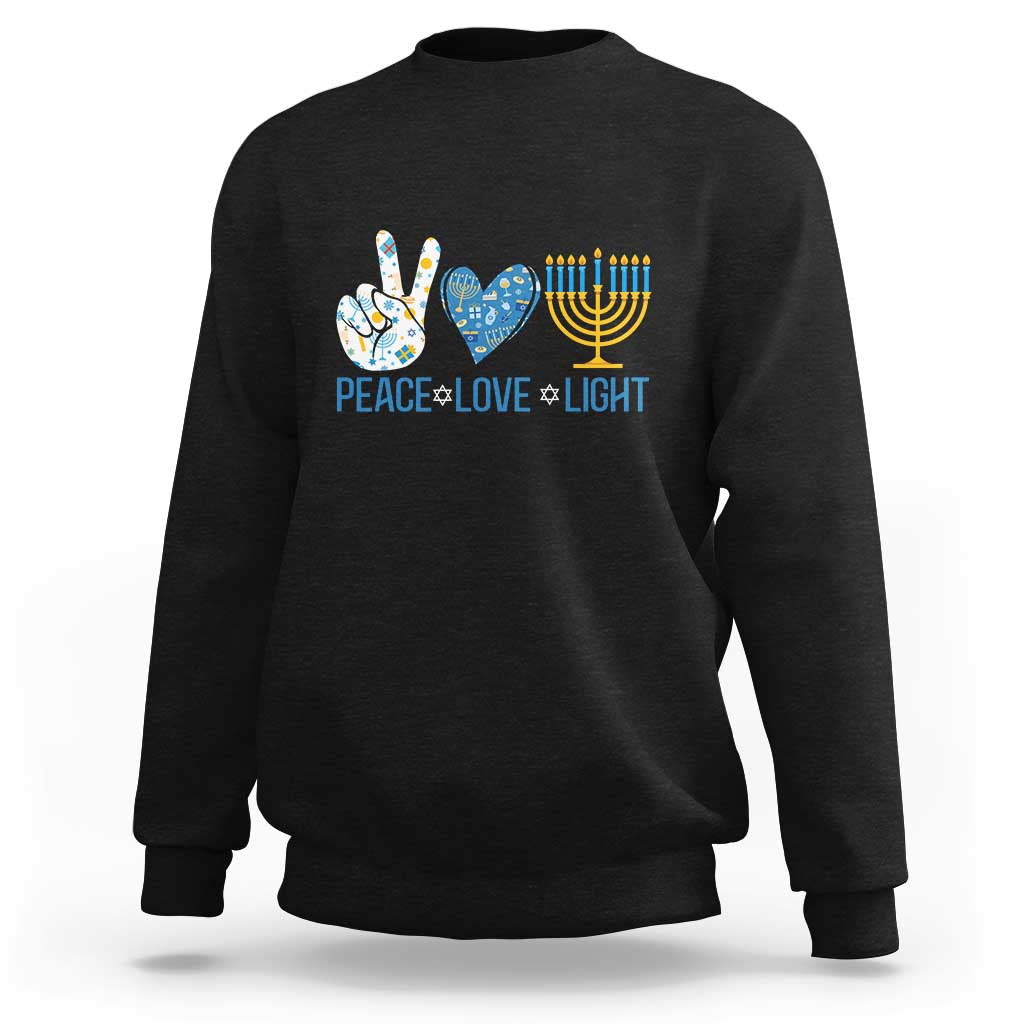Black crewneck sweatshirt with 'PEACE LOVE LIGHT' front graphic