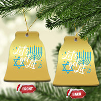 Gold bell-shaped ornament with blue menorah, Star of David, and 'Let it get lit' text