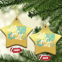 Gold star-shaped ornaments with blue menorah and Star of David; 'FRONT' and 'BACK' tags