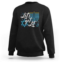 Men's black Hanukkah sweatshirt with “Let’s get lit” menorah and Star of David graphic