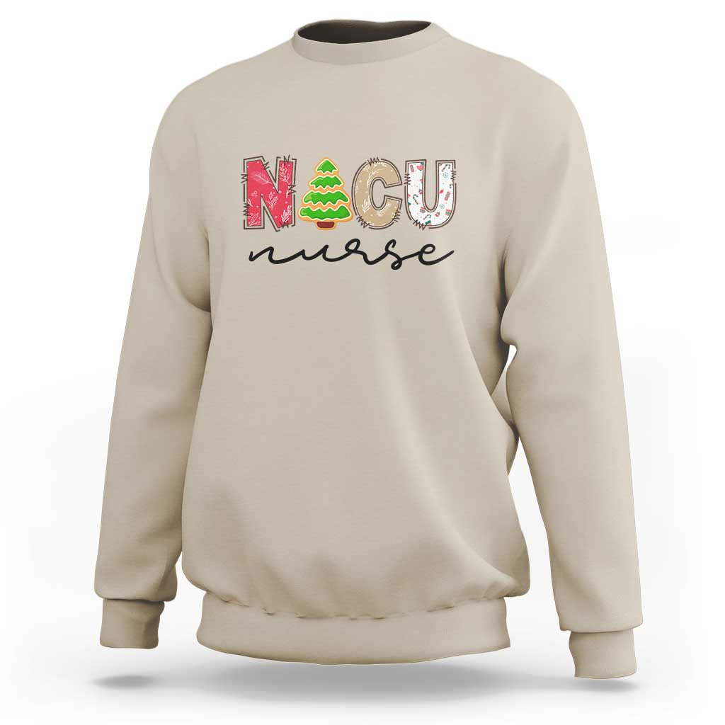 Sand crewneck sweatshirt with “NICU nurse” Christmas tree graphic