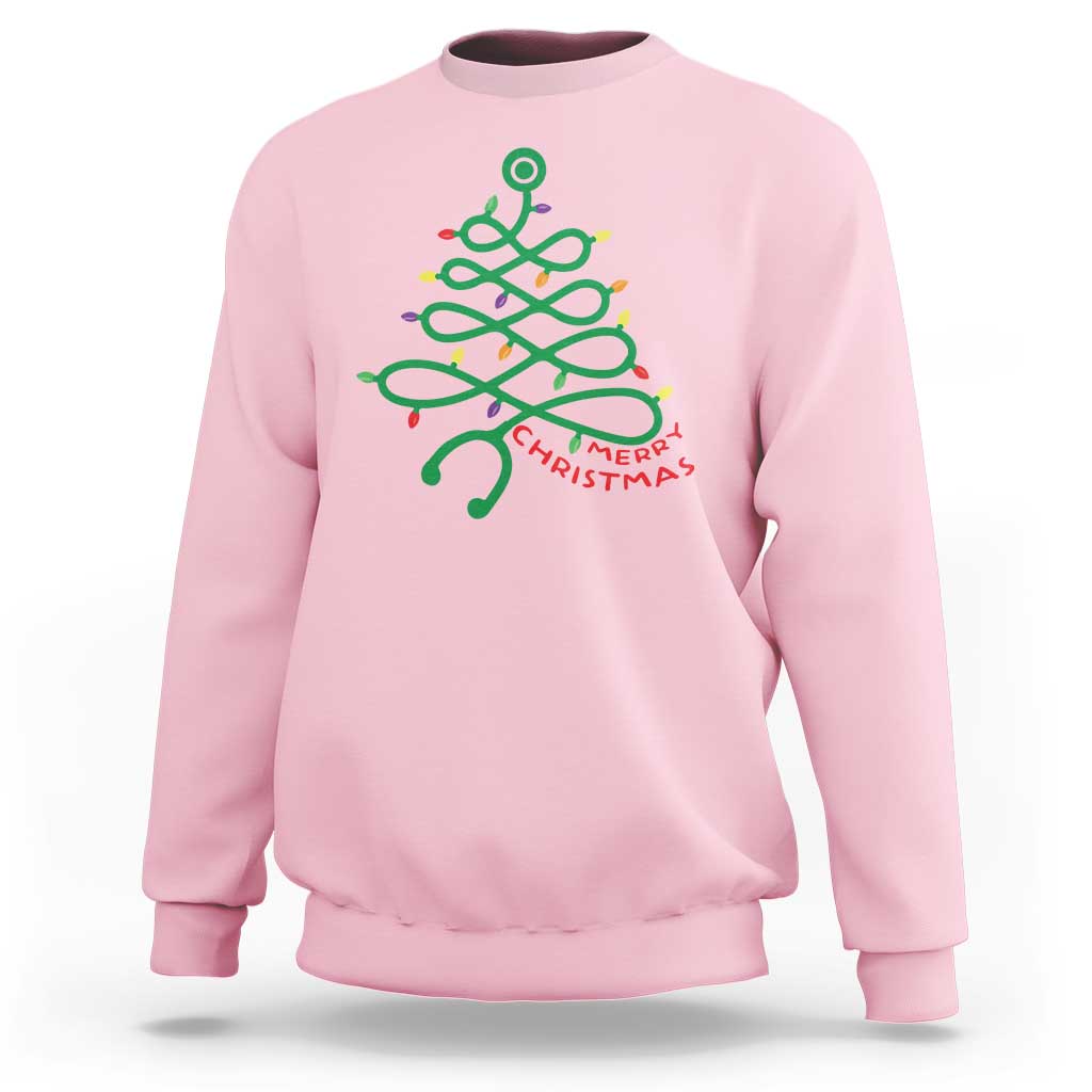 Light pink sweatshirt with colorful Christmas tree nurse stethoscope graphic