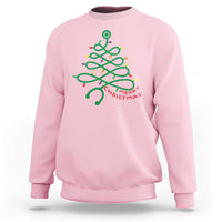 Light pink sweatshirt with colorful Christmas tree nurse stethoscope graphic