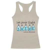 Sand racerback tank top with "Let your light SHINE" autism awareness graphic