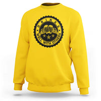 Daisy yellow crewneck sweatshirt with black circular drink graphic on the chest.