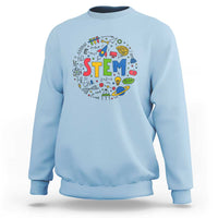 Light blue sweatshirt with colorful STEM graphic on the front and ribbed crew neck cuffs