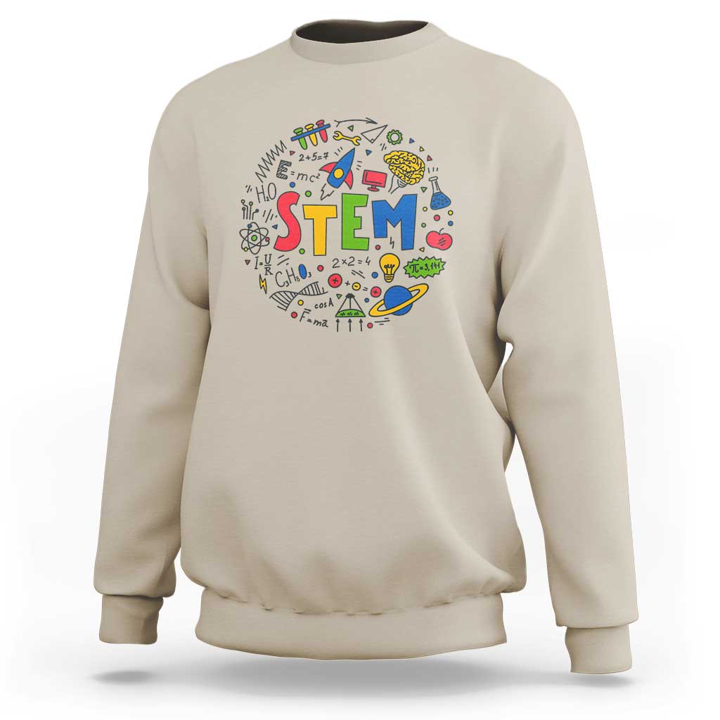 Sand beige sweatshirt with colorful STEM graphic on the front and ribbed crew neck cuffs