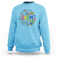 Sky blue sweatshirt with colorful STEM graphic on the front and ribbed crew neck cuffs