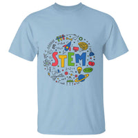 Light blue STEM teacher T-shirt with colorful STEM science icons graphic