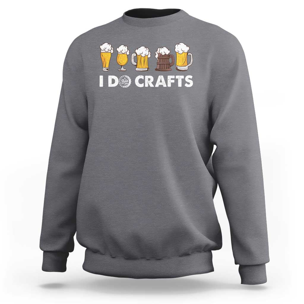 Dark heather gray crewneck sweatshirt with long sleeves and “ID CRAFTS” beer mug graphic