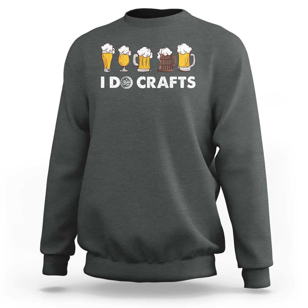 Dark heather crewneck sweatshirt with long sleeves and “ID CRAFTS” beer mug graphic