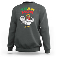 Dark heather gray crewneck sweatshirt with “YEAH MON” text and rooster graphic on front