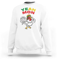 White crewneck sweatshirt with “YEAH MON” text and rooster graphic on front