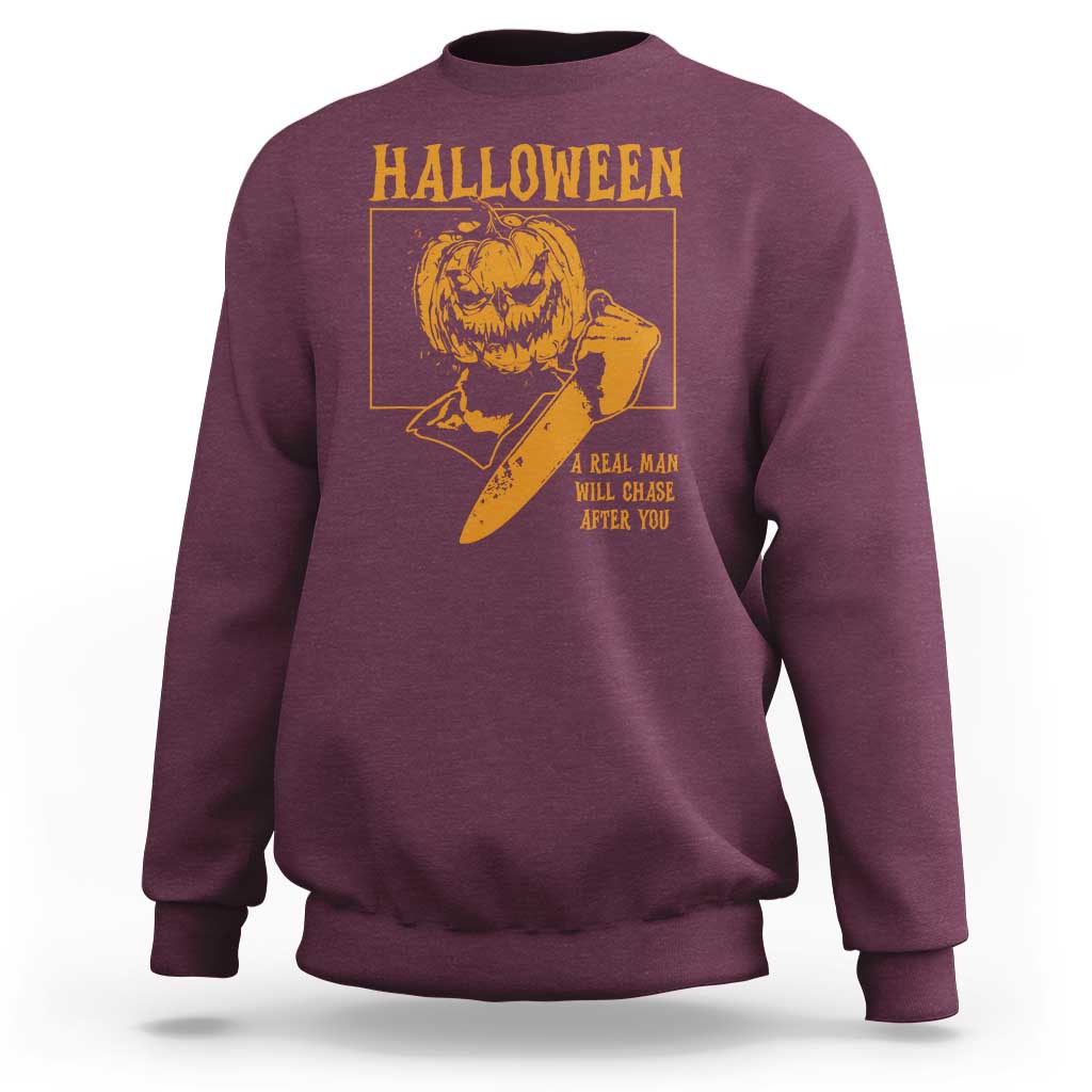 Maroon Halloween sweatshirt with pumpkin face graphic and spooky slogan