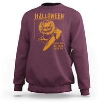 Maroon Halloween sweatshirt with pumpkin face graphic and spooky slogan