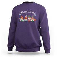 Purple crewneck sweatshirt with winter gnome graphic and white lettering.