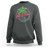 Dark heather crewneck sweatshirt with neon palm beach graphic on chest.