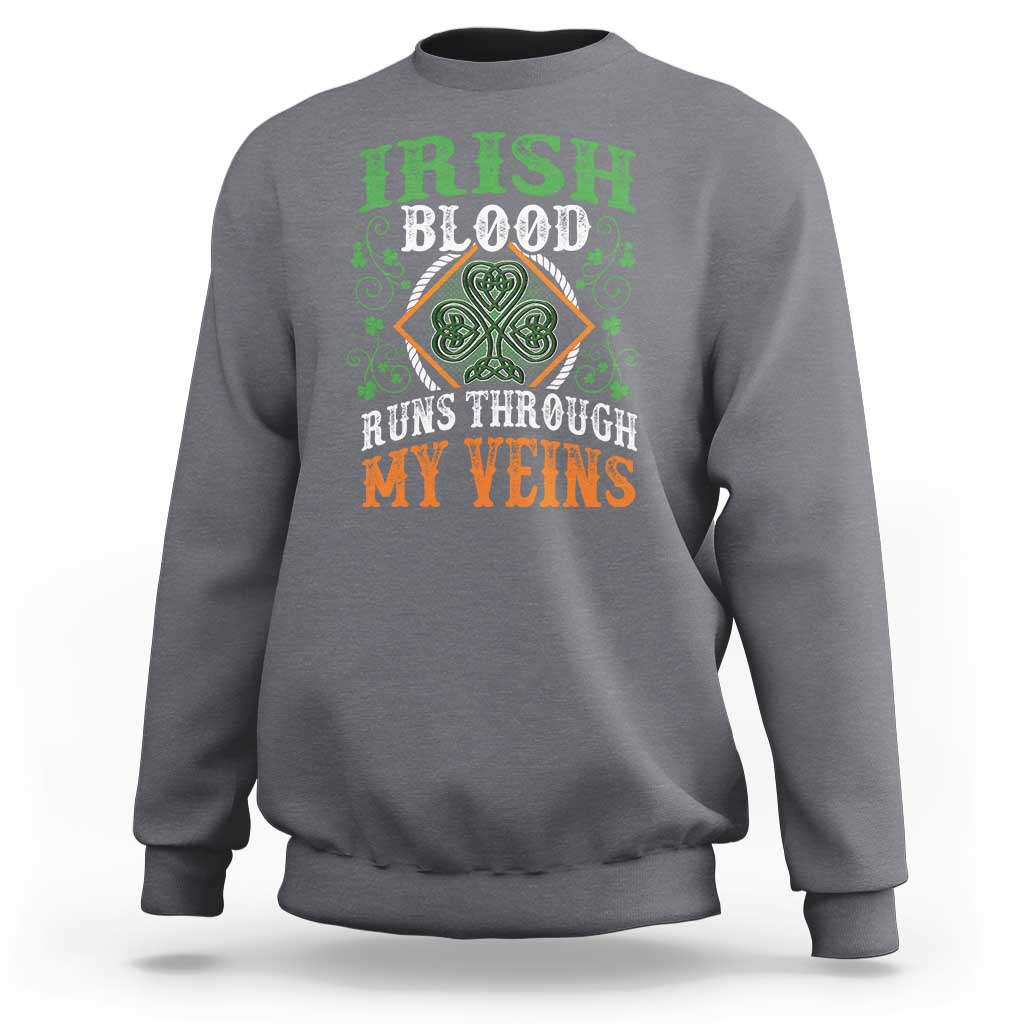 Irish pride sweatshirt in charcoal with shamrock graphic and 'IRISH BLOOD RUNS THROUGH MY VEINS'