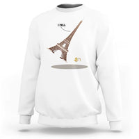 White Eiffel Tower graphic sweatshirt with “I FELL” text and banana peel design