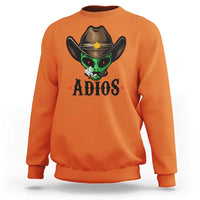 Orange crewneck sweatshirt with alien cowboy hat graphic and ADIOS print