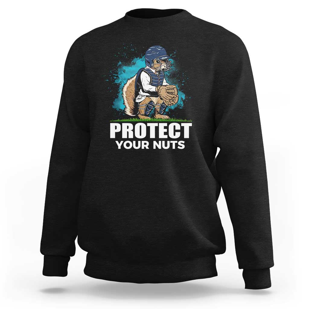 Black crewneck sweatshirt with baseball squirrel graphic and “PROTECT YOUR NUTS” print