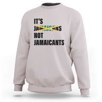 Light gray sweatshirt with bold “It’s Jamaicans Not Jamaicants” text graphic on chest
