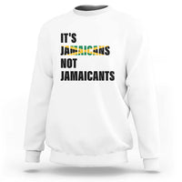 White sweatshirt with bold “It’s Jamaicans Not Jamaicants” text graphic on chest