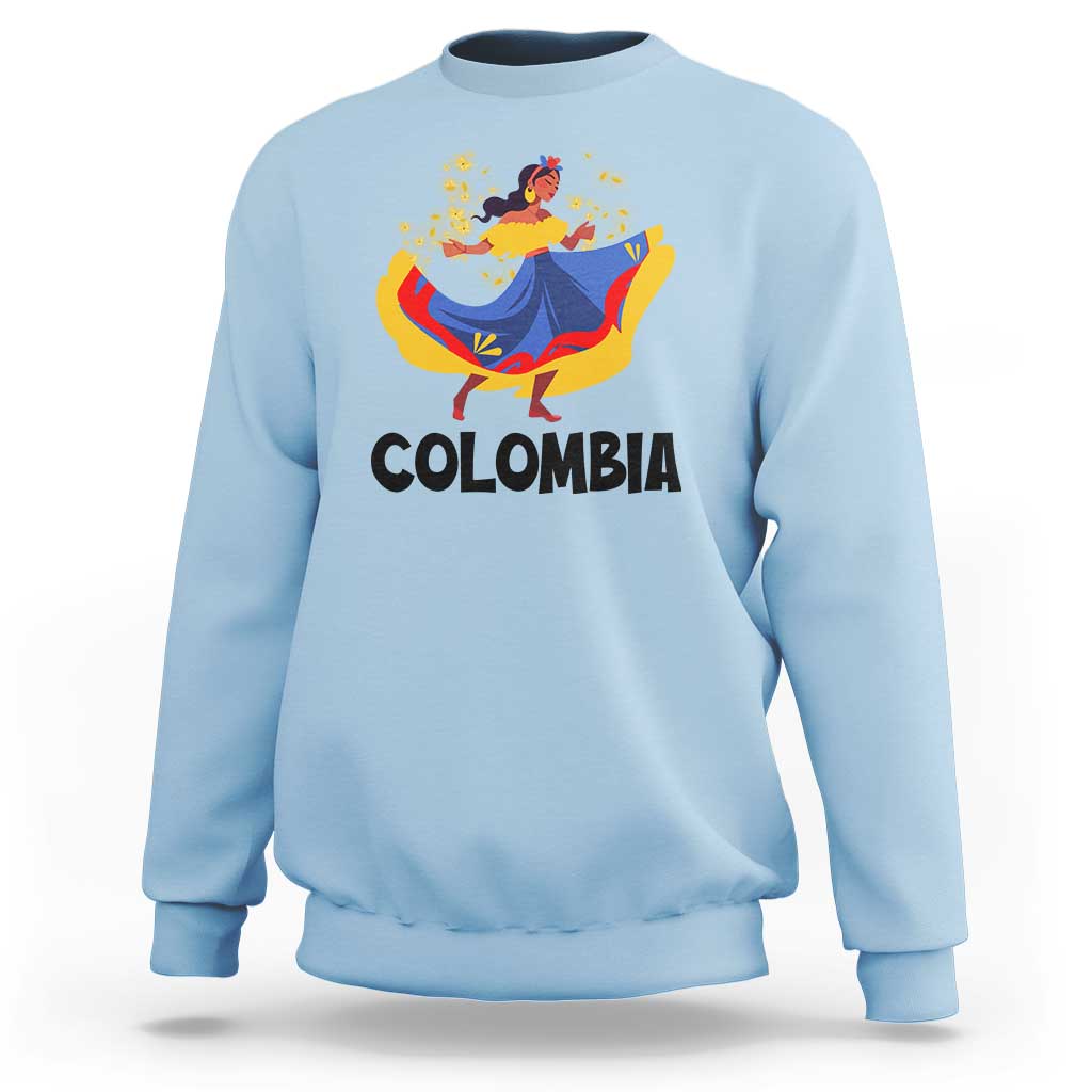 Light blue Colombia cumbia sweatshirt with dancer graphic and “COLOMBIA” text