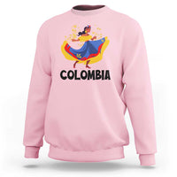 Light pink Colombia cumbia sweatshirt with dancer graphic and “COLOMBIA” text