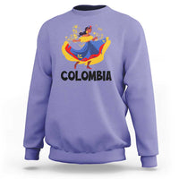 Purple Colombia cumbia sweatshirt with dancer graphic and “COLOMBIA” text