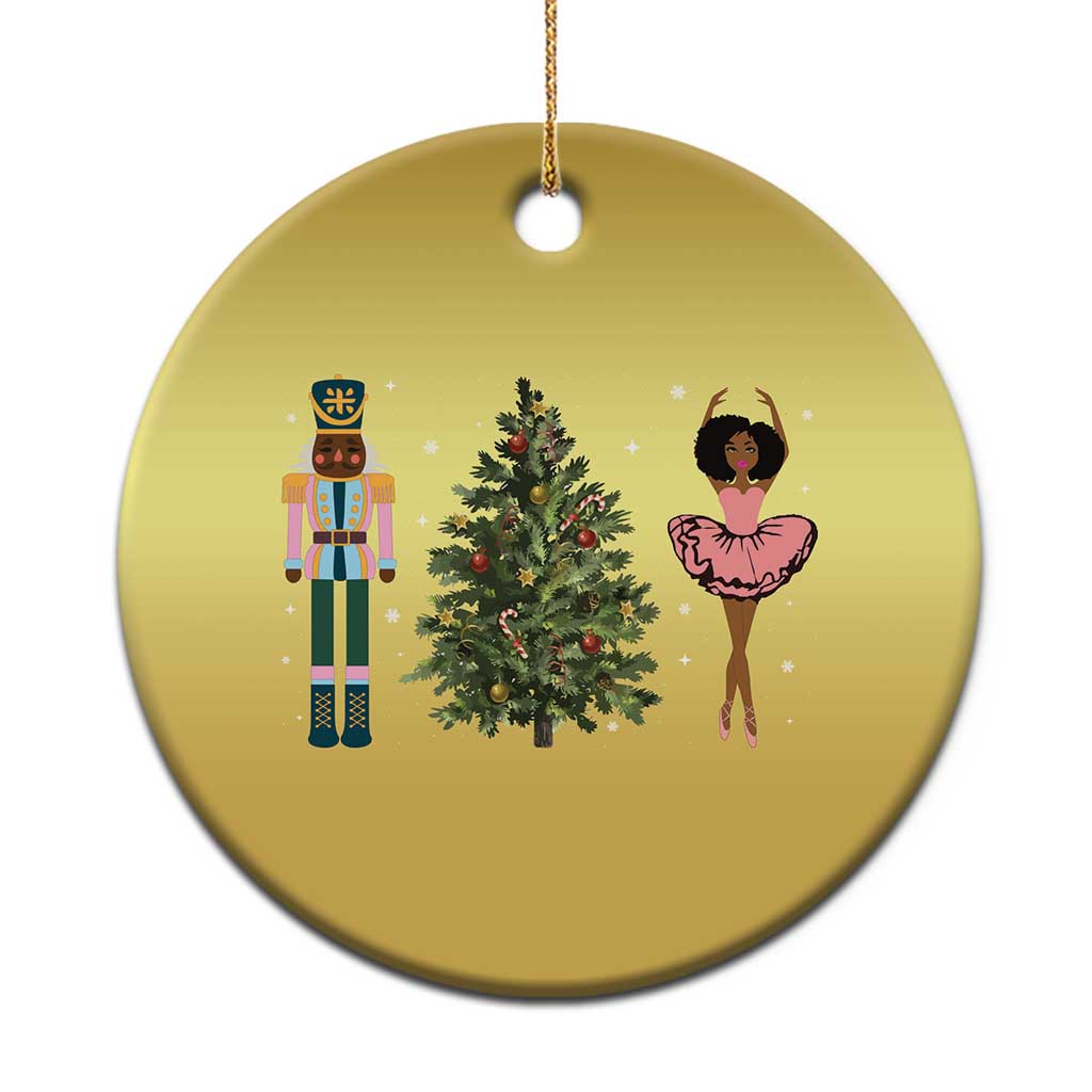 Gold round nutcracker and ballerina Christmas ornament with hanging loop