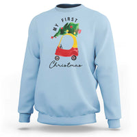 Light blue Christmas sweatshirt with toy car and Christmas tree graphic, crew neck.
