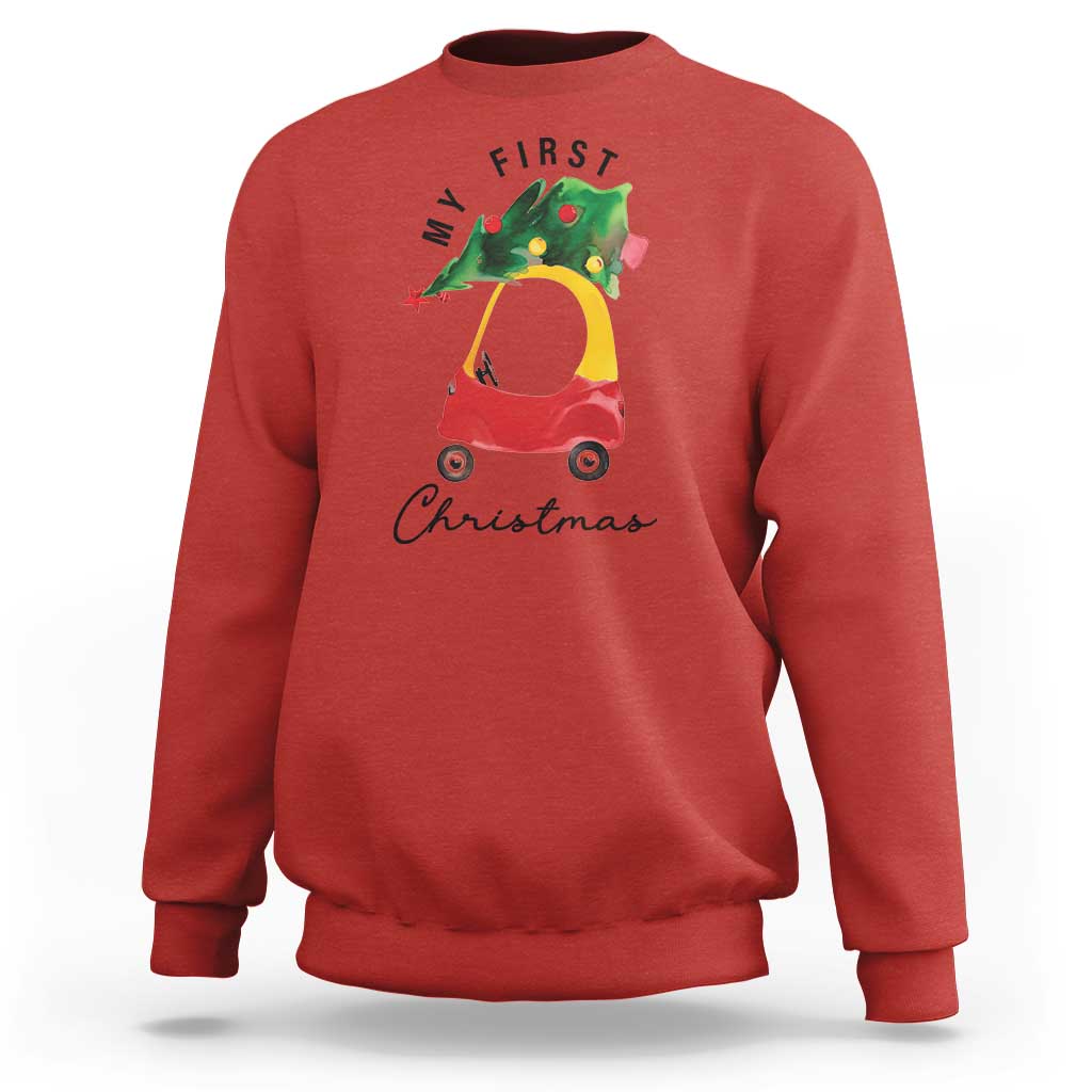 Red Christmas sweatshirt with toy car and Christmas tree graphic, crew neck.