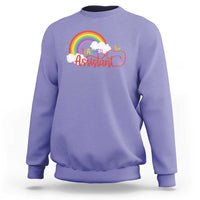 Purple teacher assistant sweatshirt with rainbow cloud apple graphic on front.