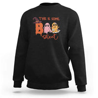 Black crewneck sweatshirt with Halloween 'This is some sweet' ghost witch graphic