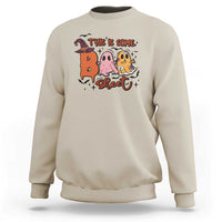 Sand crewneck sweatshirt with Halloween 'This is some sweet' ghost witch graphic