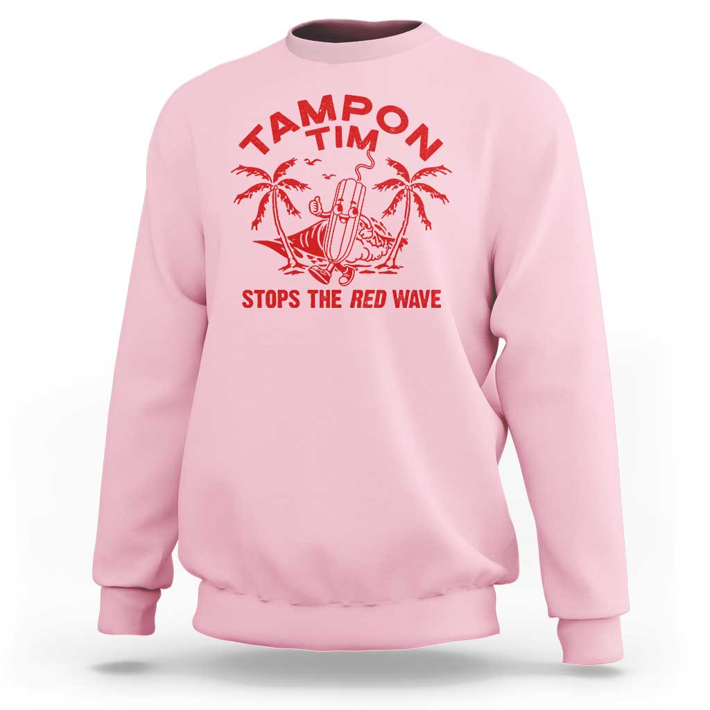 Light pink crewneck sweatshirt with red palm graphic and 'STOPS THE RED WAVE' text