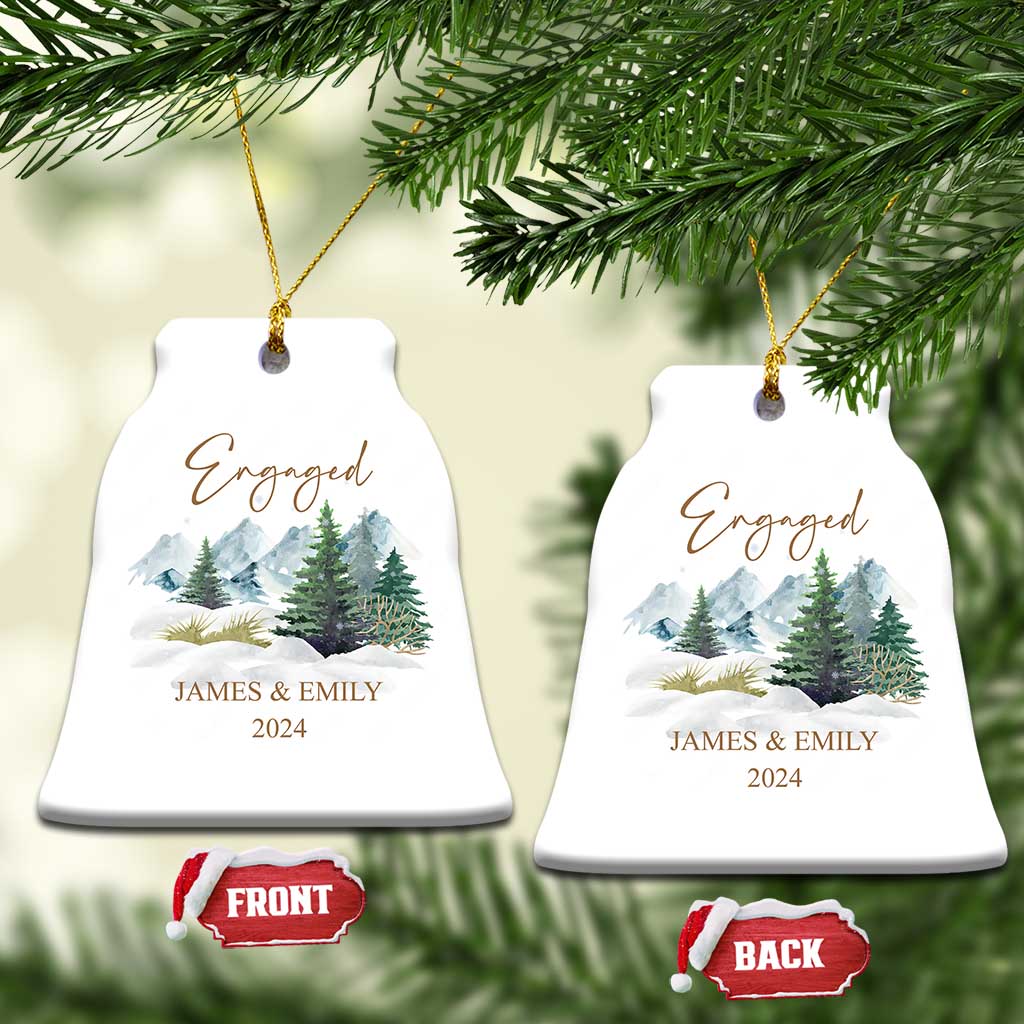 Engaged bell-shaped Christmas ornaments with gold strings, snowy forest, JAMES & EMILY, 2024